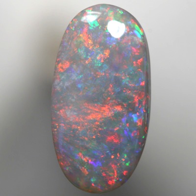 SOLID SEMI BLACK OPAL Sparkles of fire red and green over mauve